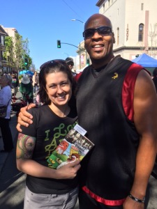 Volunteer Jenna (left) with Black Belt Champion Everett Robinson (right)