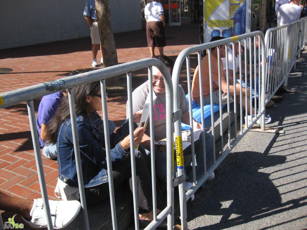 Waiting for the parade and reading a VSK from pre-parade leafleting by Ann, Katherine, Mila, Reeba and Tammy 