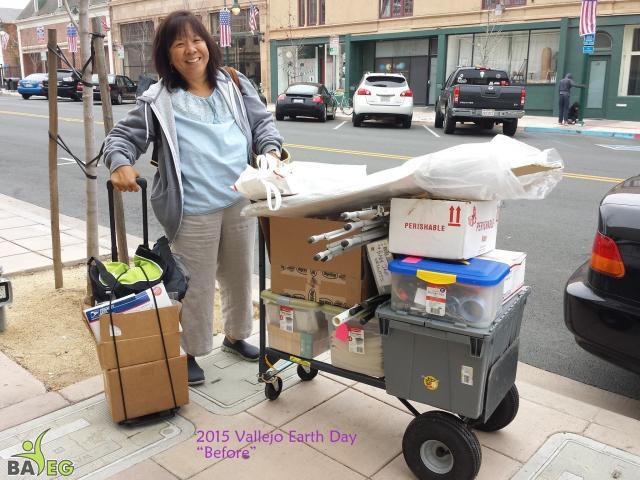 Debbie hard at work at 8 am, car unloaded and ready to setup!