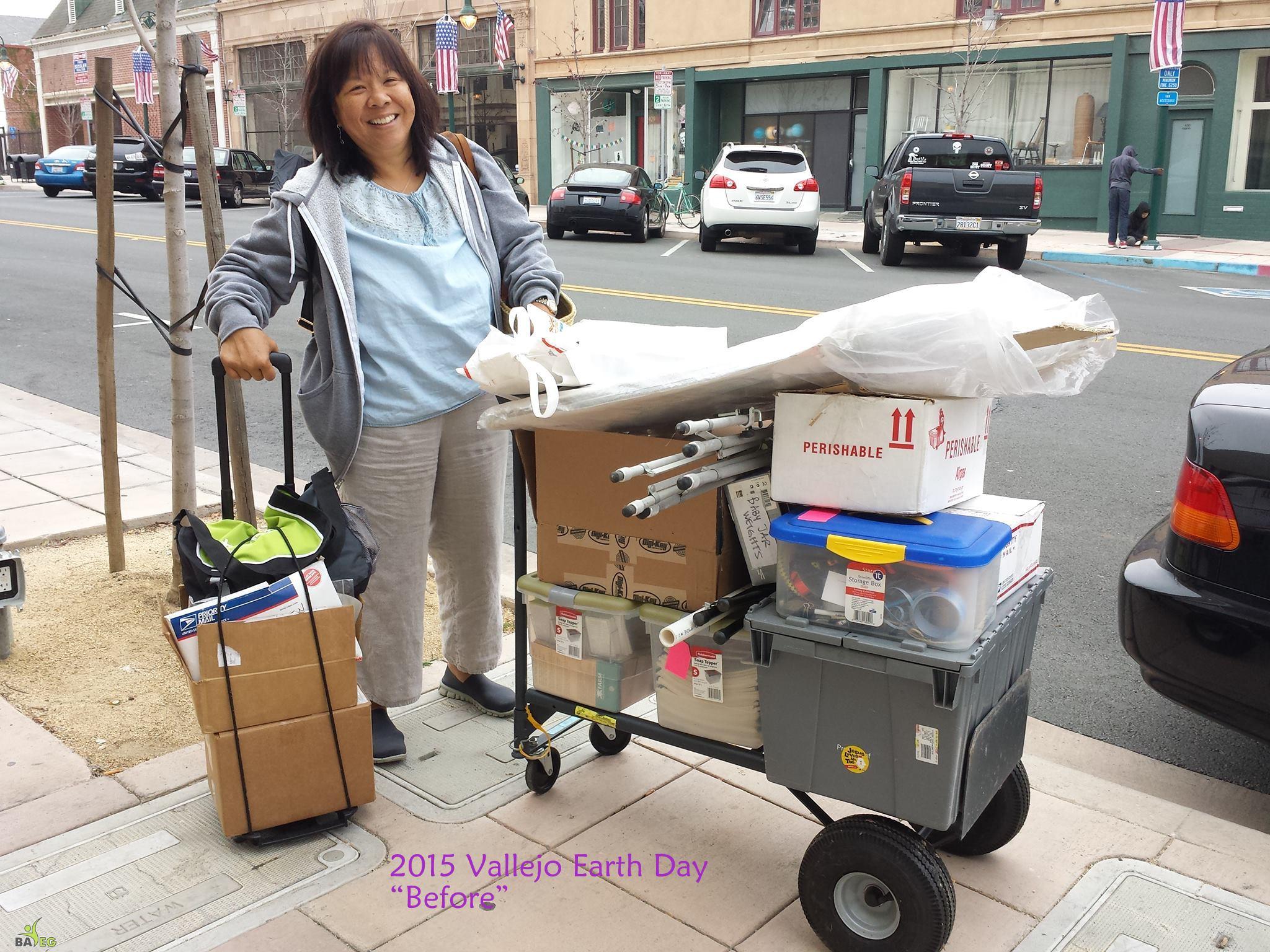 Debbie hard at work at 8 am, car unloaded and ready to setup!