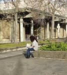 Student reading leaflet