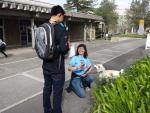 Peggy and Lao talking to interested student
