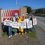 Our costumed chicken urges awareness of KFC's treatment of chickens.