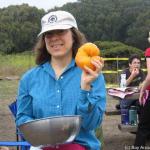Paula squeezing the tomatoes