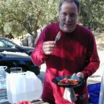 Doug taste tests the strawberries