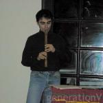 Alex playing a recorder.
