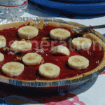 One of our other many desserts,  cheezecake with raspberry glaze & fresh organic bananas.
