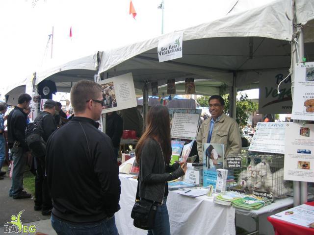Ravi answers questions at the BAVeg booth
