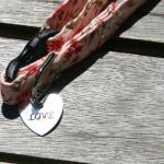 Kitty Collars - "Love" Charm closeup