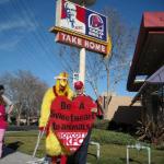 Mike "the Chicken Man" and Carol, event organizer, protest KFC Cruelty