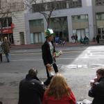 Ari leafleting the waiting parade crowd